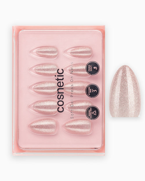 Champagne Crush press-on negle i bakke med en enkelt negl
